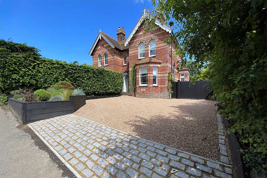 Large gravel driveway constructed using Core Drive 30-40 plastic gravel stabilising grids