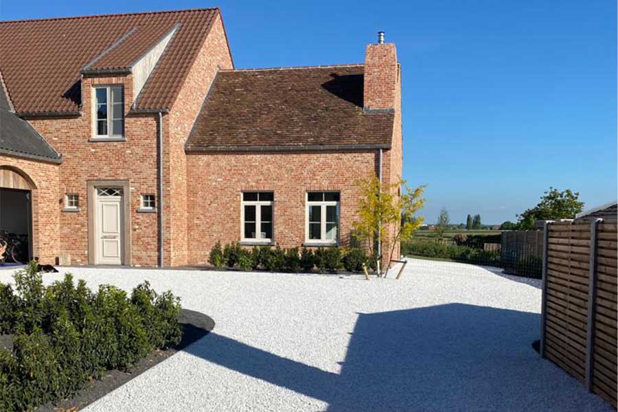 Light grey gravel driveway constructed with Core Drive plastic gravel grids