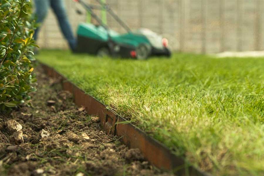 Neat lawn edge created using Core Edge metal garden edging