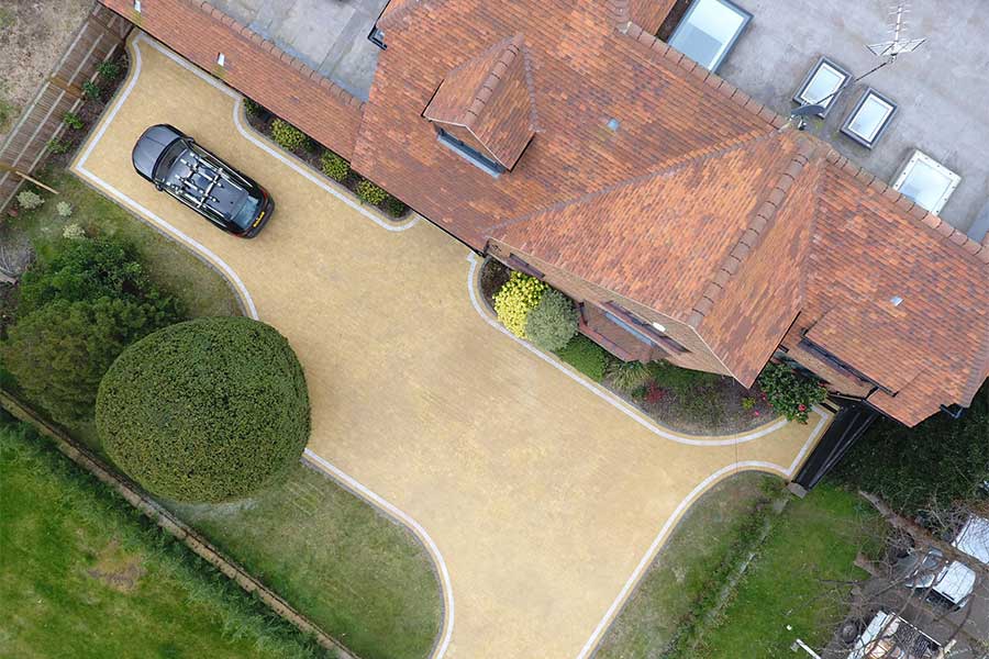 Large driveway built with permeable block paving for better surface water drainage